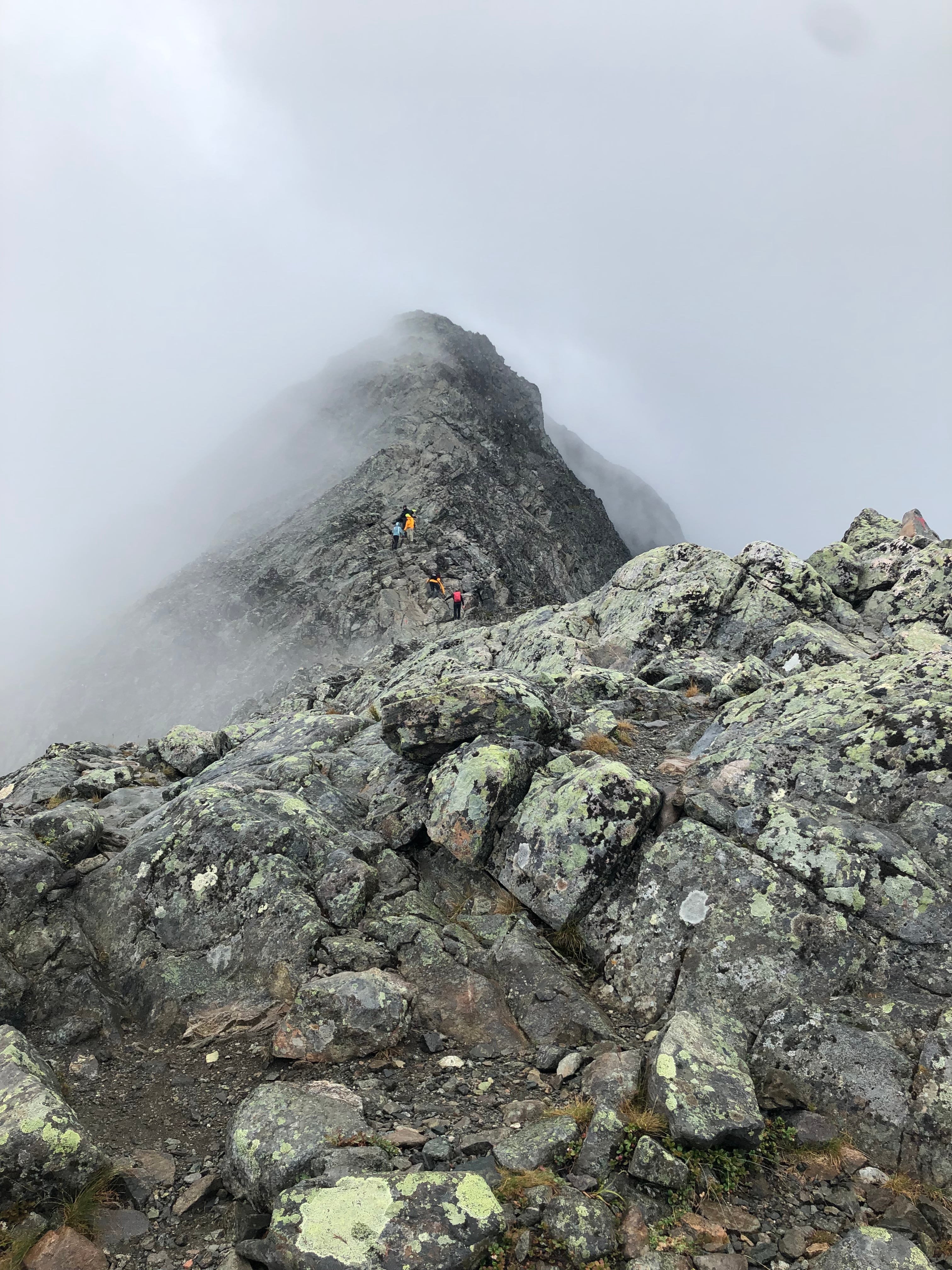The knife-edge section of Besseggen Ridge in complete whiteout conditions - zero visibility